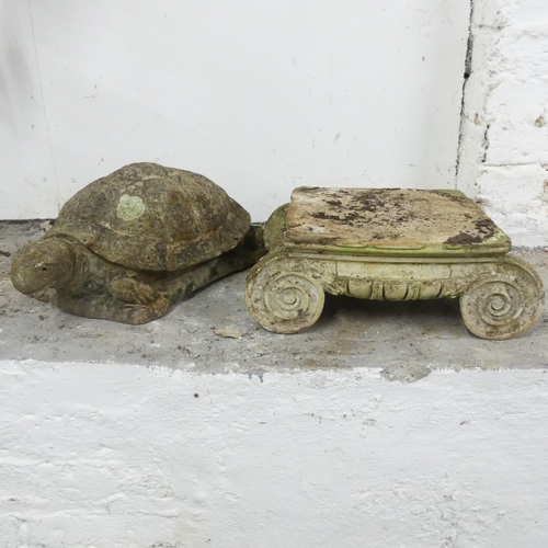 2591 - A weathered concrete garden statue of a tortoise, length45cm, and a scroll shaped pedestal. (2).