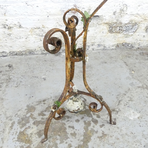 2596 - An antique painted wrought iron plant holder. Height 83cm.