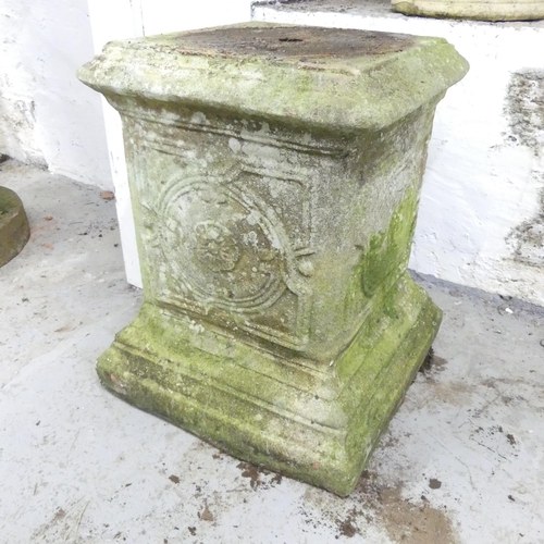 2602 - A Weathered concrete garden pedestal. 42x50cm.