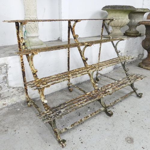 2603 - A Victorian cast iron four tier plant stand. 122x80x60cm.