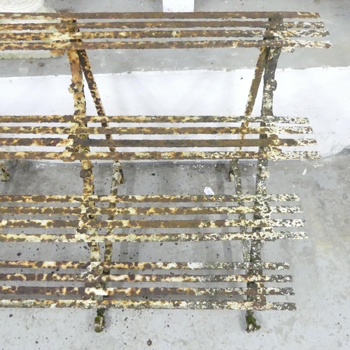 2603 - A Victorian cast iron four tier plant stand. 122x80x60cm.