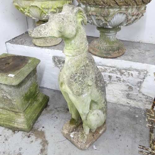 2604 - A weathered concrete statue of a hound. Height 95cm.