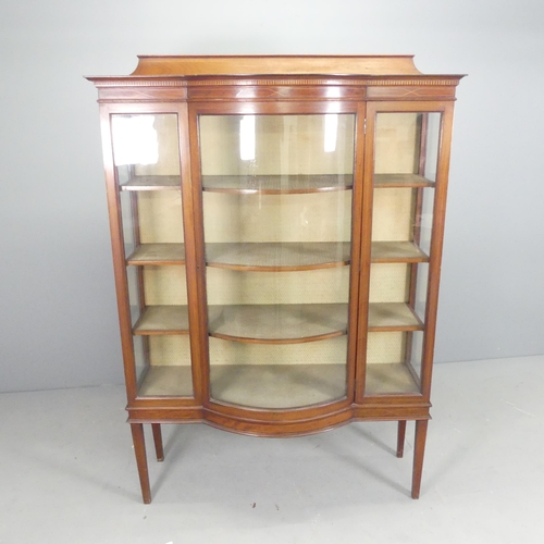 2625 - An Edwardian mahogany and satinwood strung bow-front display cabinet, with single glazed door, three... 