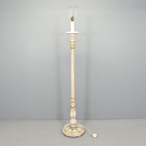 2629 - A painted continental style standard lamp, with carved and fluted decoration.