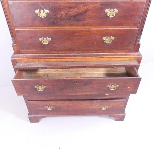 2630 - A Georgian oak two-section chest-on-chest of two short and six long drawers, with brushing slide, ca... 