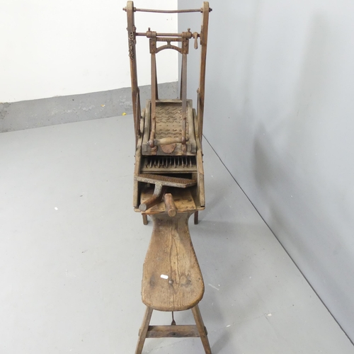 2637 - An antique oak wool carding machine. 115x120x36cm.