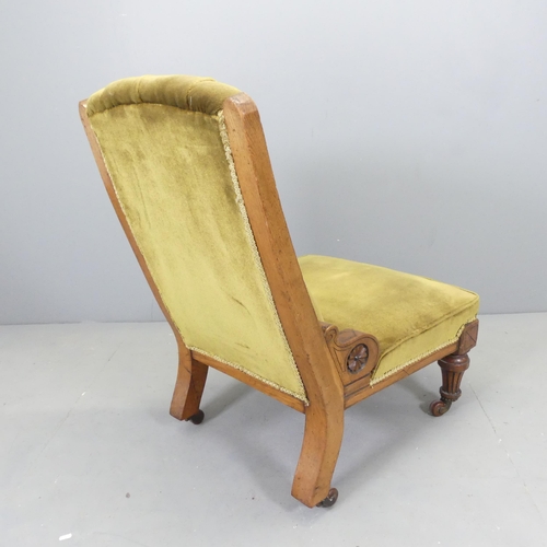 2649 - A Victorian oak and upholstered nursing chair.