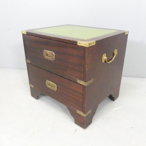 2650 - A modern small campaign style chest of two drawers, with brass mounts and inset embossed green leath... 