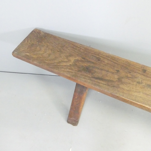 2651 - A 19th century oak bench with A frame legs. 274x50x35cm.