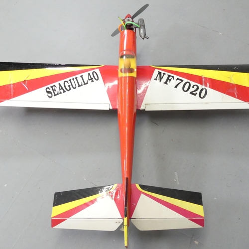 2653 - A remote controlled Seagull 40 trainer aeroplane. A/F. No control present. Wingspan 142cm, length 12... 