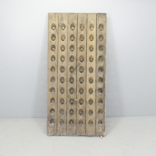 2669 - A vintage French oak Champaign riddling / bottle rack. 72x150cm.