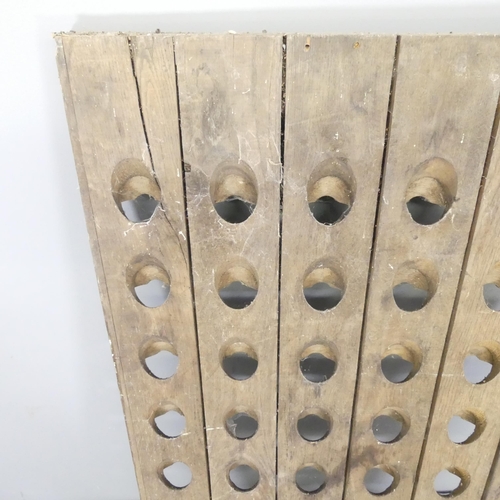 2669 - A vintage French oak Champaign riddling / bottle rack. 72x150cm.