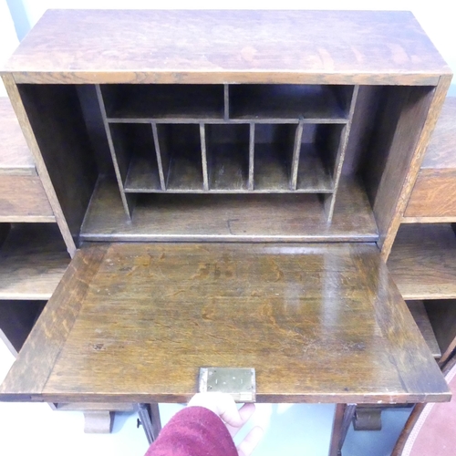 2675 - An early 20th century oak side-by-side student's bureau bookcase, 100x106x25cm, a Canterbury, etc. (... 