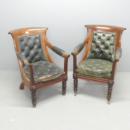 2680 - A pair of 19th century mahogany and button-back leather upholstered library armchairs.