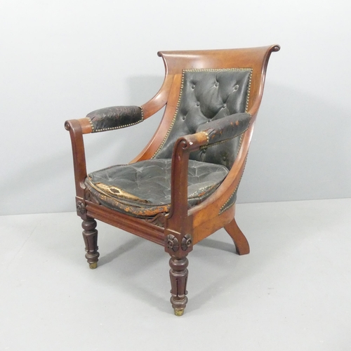 2680 - A pair of 19th century mahogany and button-back leather upholstered library armchairs.