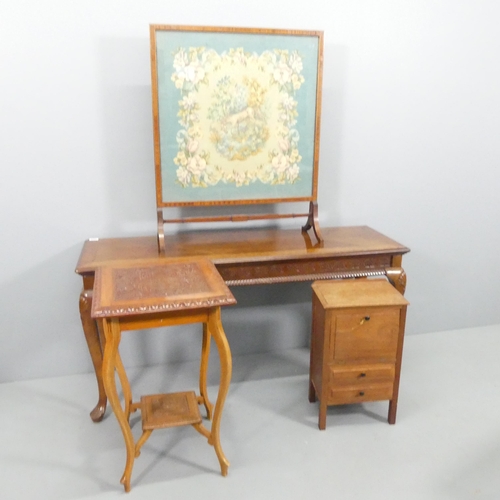 2682 - A continental style mahogany and parquetry topped side table, with carved decoration and raised on c... 