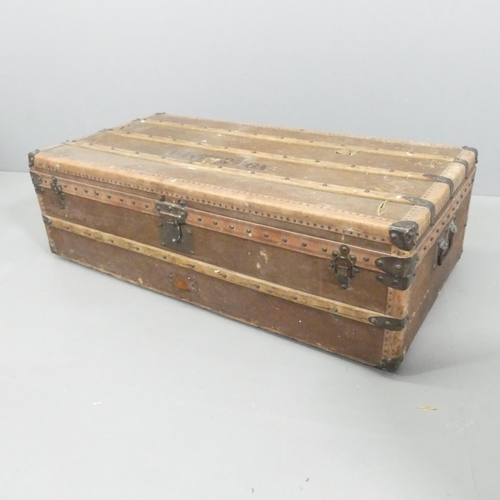 2691 - An antique tin-lined steamer trunk. Named to Winterton. 111x34x56cm.