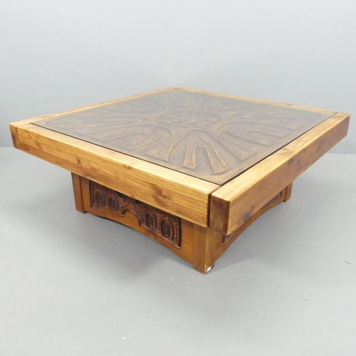 2088 - A mid-century brutalist pine coffee table. 107x43cm