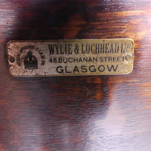 2225 - WYLIE AND LOCHHEAD - A Glasgow school Arts & Grafts oak sideboard, with raised back, two drawers bet... 