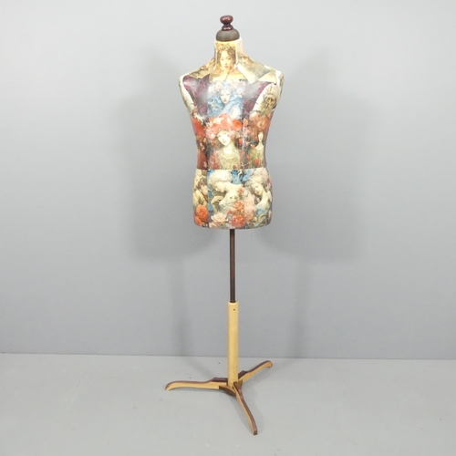 2226 - CLIVE FREDRIKSSON - A decoupage decorated mannequin of male form. Height 170cm.