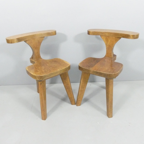 2233 - A pair of 1960s French oak brutalist smoking or reading chairs.