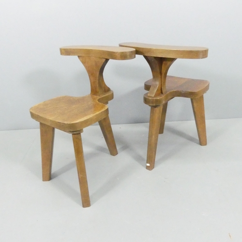 2233 - A pair of 1960s French oak brutalist smoking or reading chairs.