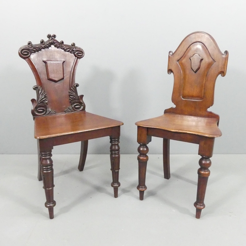 2237 - Two similar Victorian mahogany shield-back hall chairs.