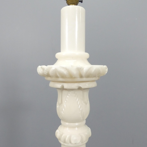 2239 - An alabaster standard lamp. Height to bayonet 135cm.