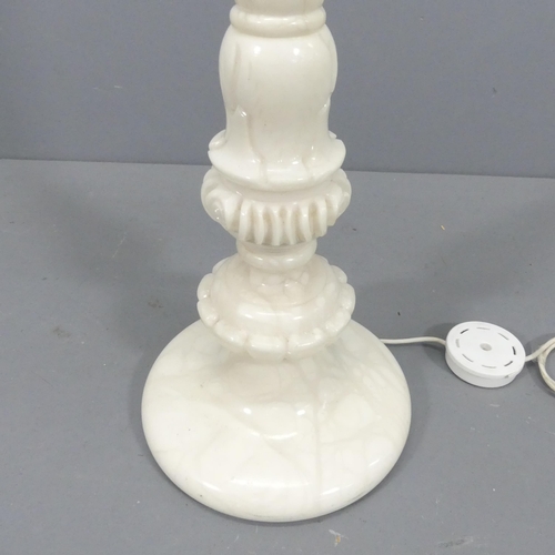 2239 - An alabaster standard lamp. Height to bayonet 135cm.