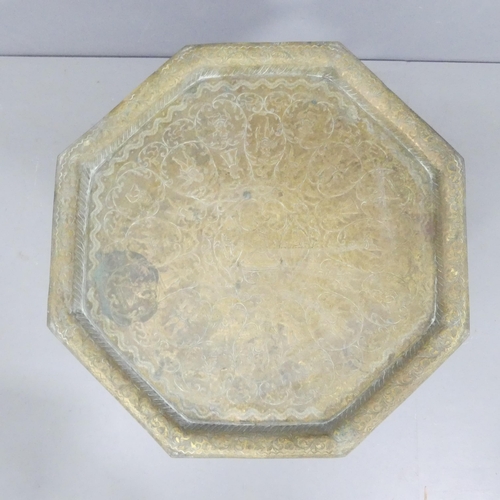 2243 - An Anglo-Indian octagonal brass tray top table on folding base. 57x48cm.