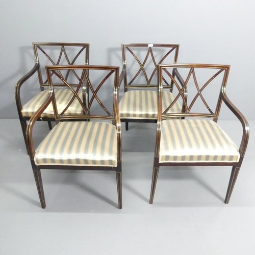 2064 - A set of four of mid-century mahogany and brass line inlaid open arm or desk chairs.