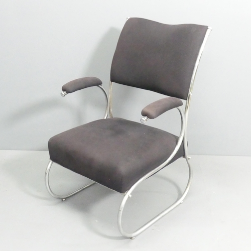 2244 - An unusual mid-century modernist lounge chair in curved tubular steel.