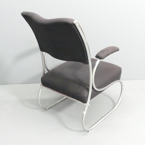 2244 - An unusual mid-century modernist lounge chair in curved tubular steel.