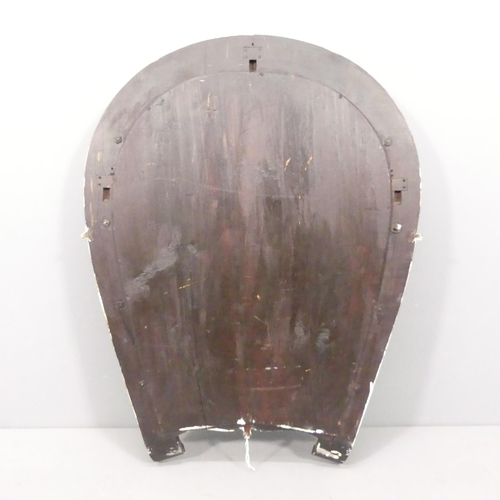 2249 - An early 20th century horseshoe design wall mirror. 77x102cm.