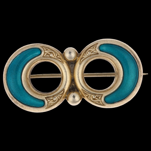 925 - ALBERT SCHARNING - a Norwegian sterling silver-gilt teal enamel openwork brooch, 37mm, 5.7g