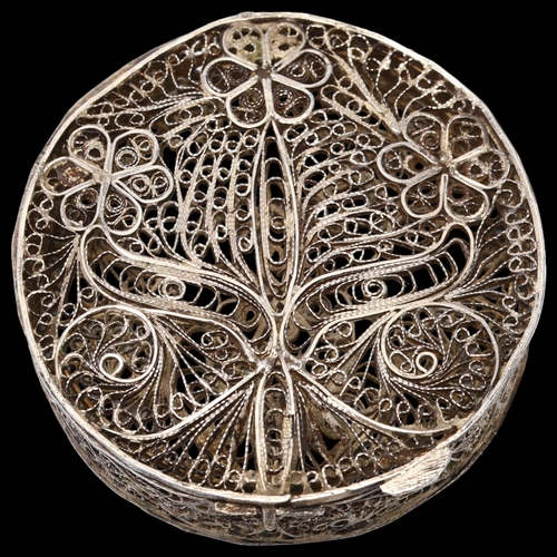 922 - An Indian silver filigree floral box, circular form, 6cm