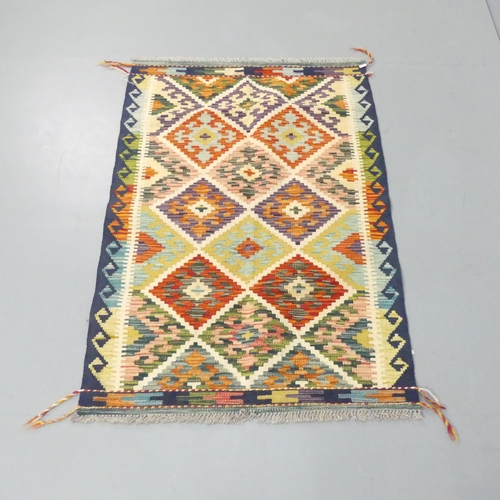 2269 - A Chobi Kilim rug. 120x84cm.