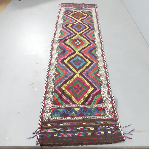 2272 - A Suzni runner. 291x70cm.