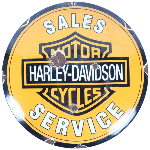 103 - A reproduction enamel Harley-Davidson sign, 29cm