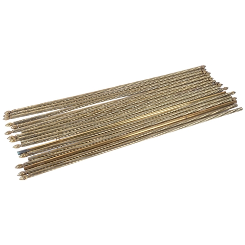 113 - A quantity of spiralled brass stair rods. 10 rods have both associated finials, 3 with only a single... 