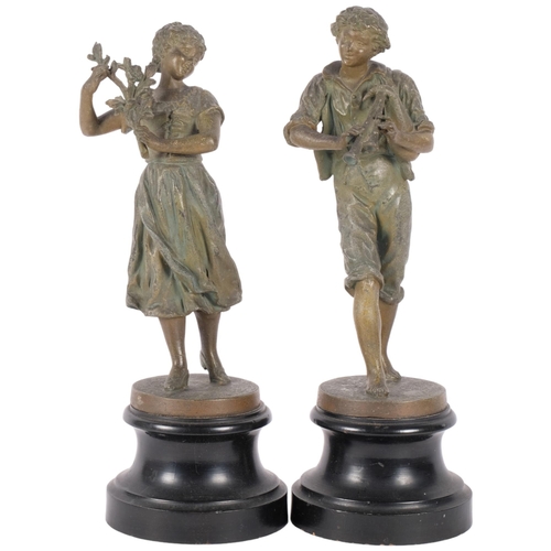 121 - A pair of spelter figures on hardwood stands. One of a young male musician (H-31cm), the other a gir... 