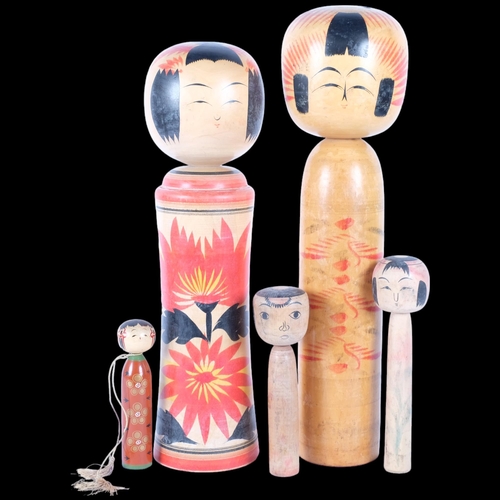 130 - A group of 5 Japanese Folk Art Kokeshi dolls, Largest - 54cm.