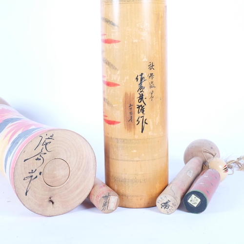 130 - A group of 5 Japanese Folk Art Kokeshi dolls, Largest - 54cm.