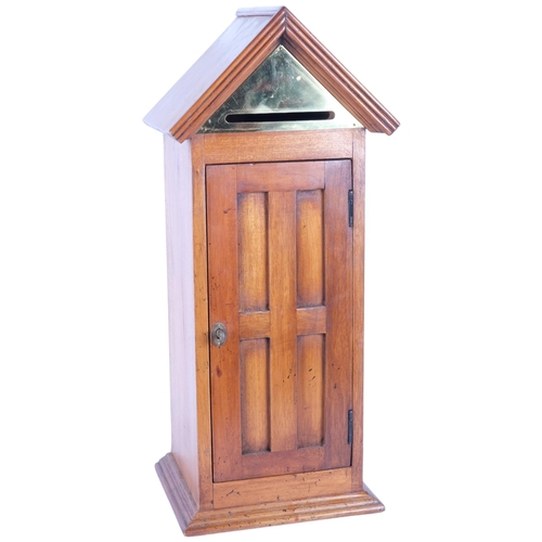 135 - A hardwood porch design mailbox with brass mount, H56cm