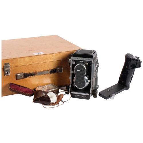 162 - A Mamiya C3 professional twin-lens reflex camera, with associated Mamiya-sekor lenses (serials 11506... 