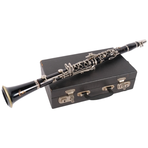 164 - Boosey & Hawkes Ltd - The edgeware clarinet, SN 185522, in hard shell case, with various solo musica... 