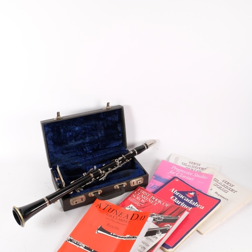 164 - Boosey & Hawkes Ltd - The edgeware clarinet, SN 185522, in hard shell case, with various solo musica... 