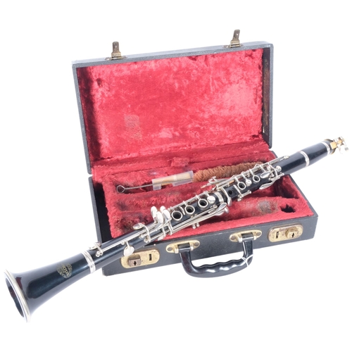 172 - A Corton clarinet, SN 609393, in hard shell case.