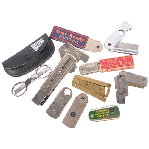 205 - A collection of various cigar cutters including Ever-ready, Swift sure etc.