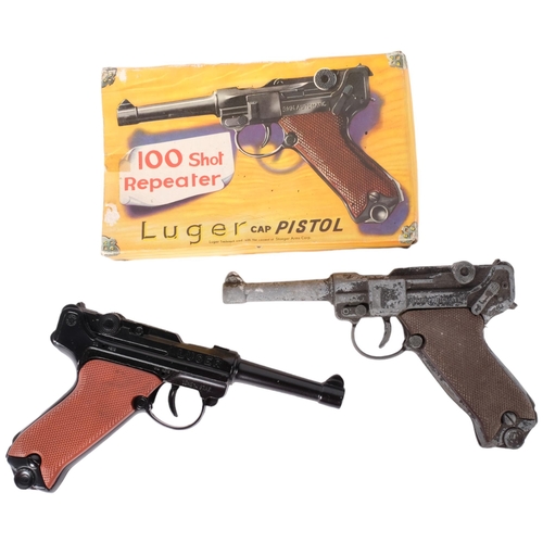 214 - 2 Luger 100-shot repeater cap pistols, 1 boxed.